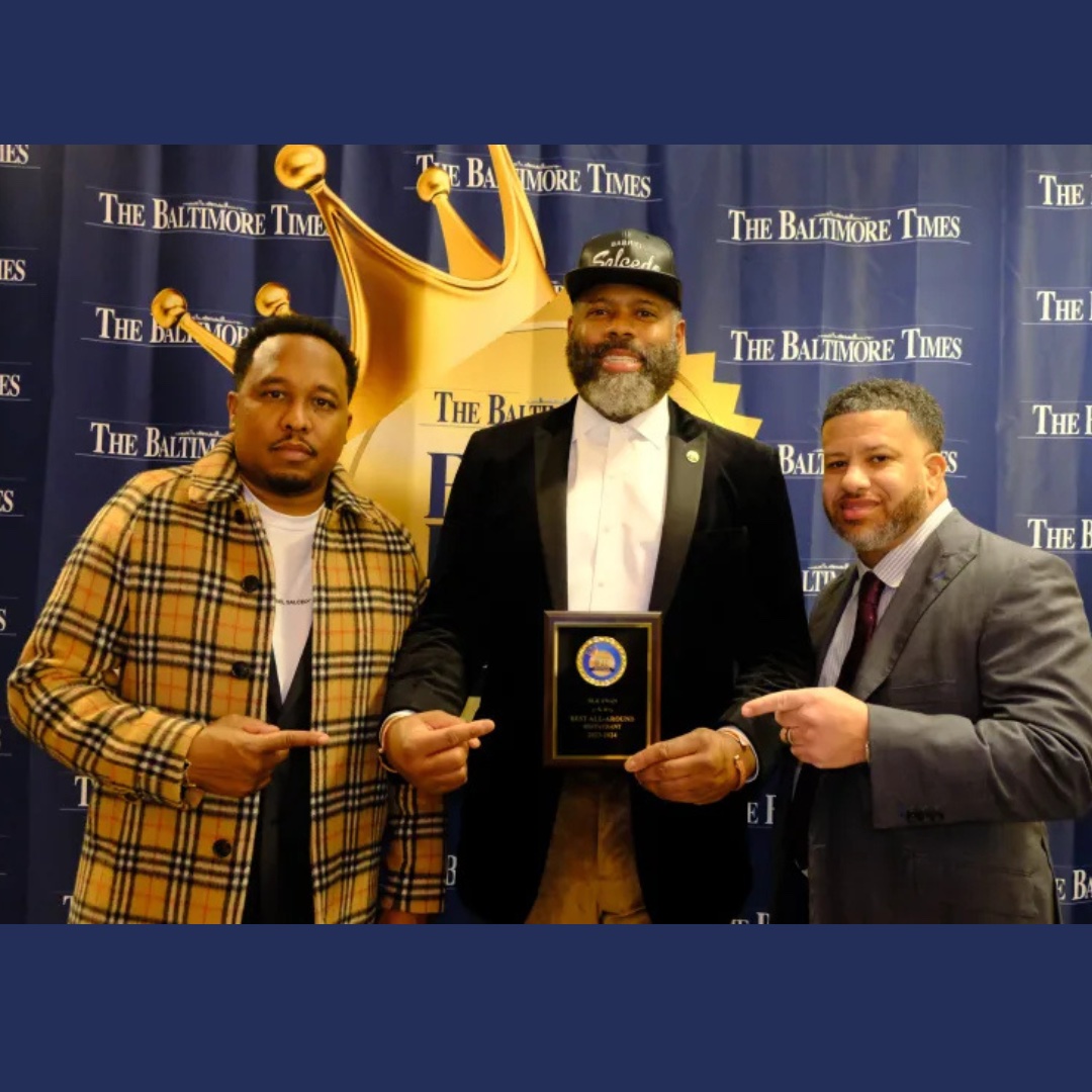 Chris Simon, left, owner of Blk Swan; Saon Brice and Chris McCray pose with the Best All-round Restaurant award. Credit: EDOGHOGHO UGIAGBE
